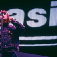 Singer Liam Gallagher performing with British rock band Oasis, UK, August 1996.