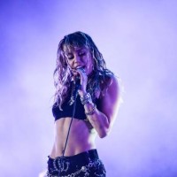 Singer Miley Cyrus performs on stage during a concert at the Sunny Hill Festival in Pristina on August 2, 2019.