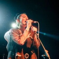 singer of music band performing on, stage light and smoke effects. - concert stock pictures, royalty-free photos & images