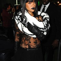 Singer Rihanna attends the Jean Paul Gaultier show as part of the Paris Fashion Week Womenswear Fall/Winter 2014-2015 on March 1, 2014 in Paris,...