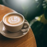 sip, savor, and enjoy: a perfectly crafted cappuccino with a beautiful twist - coffee stockfoto's en -beelden