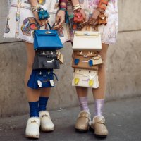 Sisters Snehal and Jyoti Babani wear white colourful printed silk shirt dress, 12 Hermes bags, and pink colourful silk printed shirt dress, 12 Hermes...