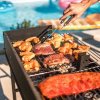 sizzling meat on the grill by hispanic chef - food stock pictures, royalty-free photos & images