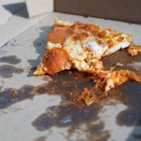 slice of pepperoni pizza inside the pizza cardboard box - junk food stock pictures, royalty-free photos & images