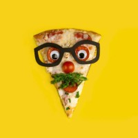 slice of pizza decorated as a surprised man in glasses on a yellow background - food stock pictures, royalty-free photos & images