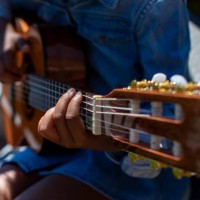 small girl learning to play the guitar - concert stock pictures, royalty-free photos & images