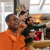 small house party during winter holidays at home - junk food stock pictures, royalty-free photos & images