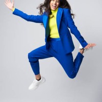 smartly dressed gen z woman jumping - fashion stock pictures, royalty-free photos & images