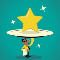 smiling businessman carrying a huge plate with a big star on it - food stock illustrations