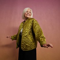 smiling elderly blond woman dancing in studio - fashion stock pictures, royalty-free photos & images