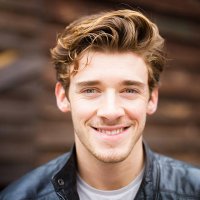 smiling handsome happy cheerful english male student wearing leather jacket - hairstyle stock pictures, royalty-free photos & images