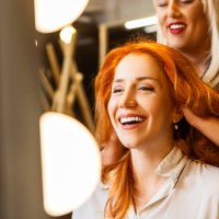 smiling woman at hairdresser - hairstyle stock pictures, royalty-free photos & images