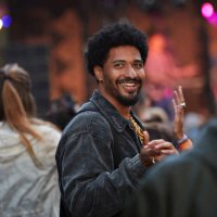 smiling young man dancing with girlfriend - concert stock pictures, royalty-free photos & images