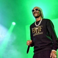 Snoop Dogg performs onstage during the BMF world premiere screening and concert at Cellairis Amphitheatre at Lakewood on September 23, 2021 in...