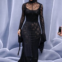 Socialite Kim Kardashian poses as she arrives for the presentation of creations by Balenciaga for the Women Ready-to-wear Fall-Winter 2024/2025...