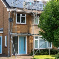 solar panels and scaffolding on a semi-detached house - home decoration stock pictures, royalty-free photos & images