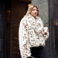 Sophia Geiss wears white and brown fur coat, black pants during the Copenhagen Fashion Week Autumn/Winter 2025 on January 30, 2025 in Copenhagen,...