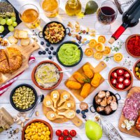 spanish tapas, beer and wine on white table - food stock pictures, royalty-free photos & images