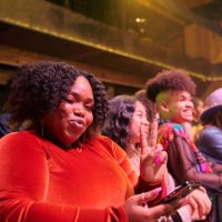 spectator pouting and showing the peace sign at a music event. - concert stock pictures, royalty-free photos & images