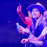 spectators recording a video with phone at a music event. - concert stock pictures, royalty-free photos & images