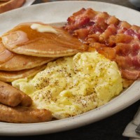 spicy chili crisp breakfast with scambled eggs, pancakes, bacon, sausages and toast - food stock pictures, royalty-free photos & images