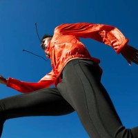 sportsman running against clear blue sky during sunny day - fashion stock pictures, royalty-free photos & images