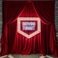 spotlight on opening red stage curtain - concert stock pictures, royalty-free photos & images