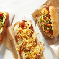 spread of three types of hot dogs - junk food stock pictures, royalty-free photos & images