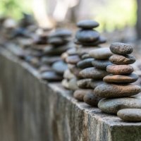 stacked stones decoration in japanese garden. - garden decoration stock pictures, royalty-free photos & images