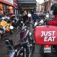 Staff of takeaway food online 'Just Eat' seen on Camden Street in Dublin. On Saturday, 14 January 2017, Dublin, Ireland.