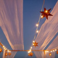 star lanterns in the evening sky with string lights - home decoration stock pictures, royalty-free photos & images