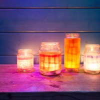 still life of handmade lanterns on table against blue wooden wall - garden decoration stock pictures, royalty-free photos & images