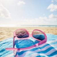 still life of sunglasses at beach against sea and sky - home decoration stock pictures, royalty-free photos & images