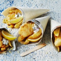 still life with fish and chips in cones - junk food stock pictures, royalty-free photos & images
