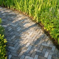 stone tile walkway on the outdoor lawn . decorate your garden. - garden decoration stock pictures, royalty-free photos & images