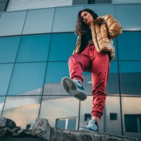 street styled young woman enjoying a day in the city street - fashion stock pictures, royalty-free photos & images