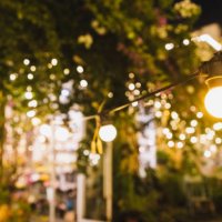 string light illuminated at night in the garden - garden decoration stock pictures, royalty-free photos & images