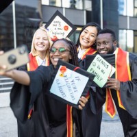 students after graduation ceremony taking selfie - garden decoration stock pictures, royalty-free photos & images