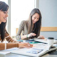students working together at desk - junk food stock pictures, royalty-free photos & images