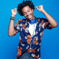 studio portrait of dancing young man in hawaiian shirt - fashion stock pictures, royalty-free photos & images