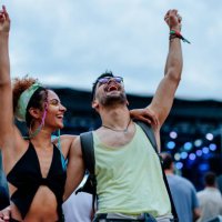 stylish couple enjoying music at concert - concert stock pictures, royalty-free photos & images