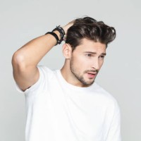 stylish man posing on grey background - fashion stock pictures, royalty-free photos & images