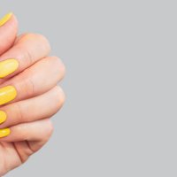 stylish neon yellow manicure on gray background. - nails art stock pictures, royalty-free photos & images