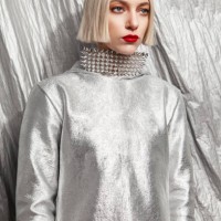 stylish woman in extravagant metallic wear with silver background - fashion stock pictures, royalty-free photos & images