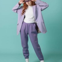 stylish young model in colored clothes posing in the studio on a colored background in fashionable technological glasses of virtual reality. fashion concept. - fashion stock pictures, royalty-free photos & images