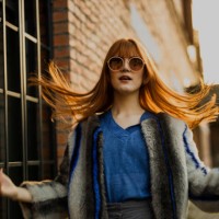 stylish young woman walking on the street - fashion stock pictures, royalty-free photos & images