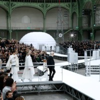 Stylist Karl Lagerfeld and his Godson Hudson Kroenig acknowledge the applause of the audience at the end of the Chanel show as part of the Paris...