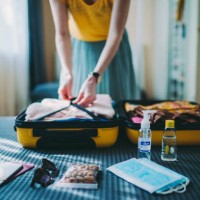 suitcase packing for travel, covid-19 - travel stock pictures, royalty-free photos & images