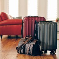 suitcases in a home ready for travel - travel stock pictures, royalty-free photos & images