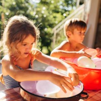summer water bombs refresment - garden decoration stockfoto's en -beelden